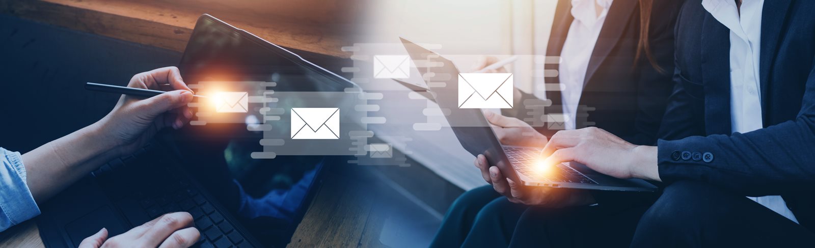 people holding laptops with floating email symbols
